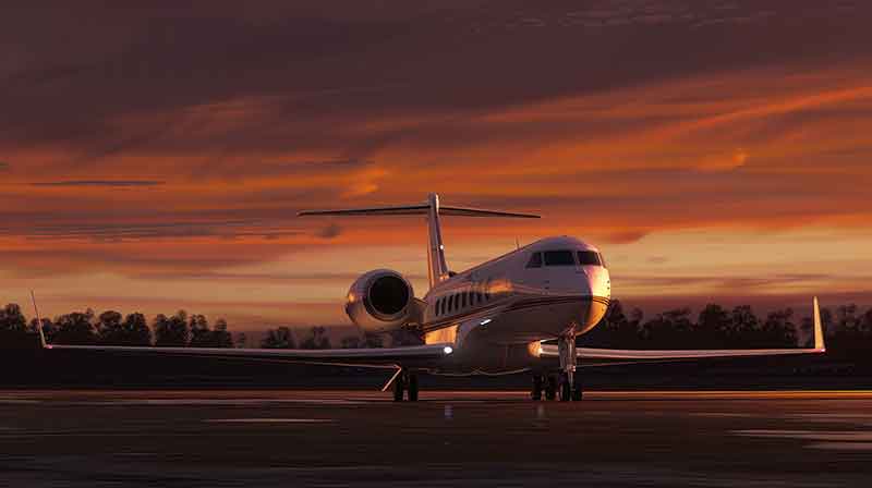 A private jet on the runway at the golden hour.