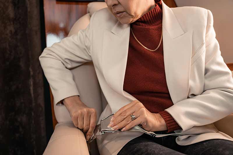 Woman fixes private jet seat ensuring passenger safety
