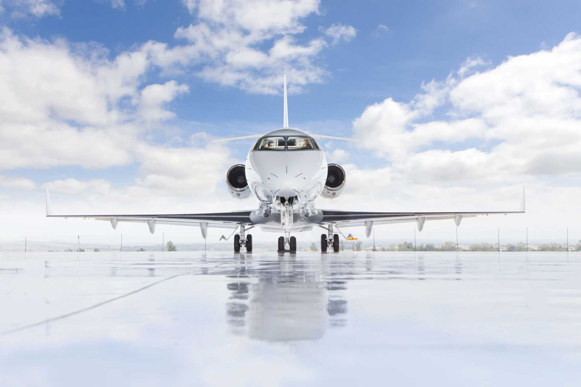 Private Jet sitting on the tarmac on a beautiful day